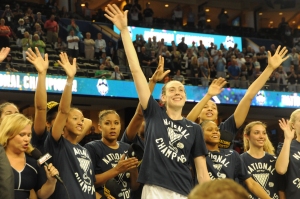 The Lady Huskies acknowledge the crowd at Amalie Arena after winning the National Championship.